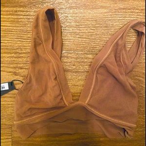 SKIMS SIZE XS , color is NUDE.